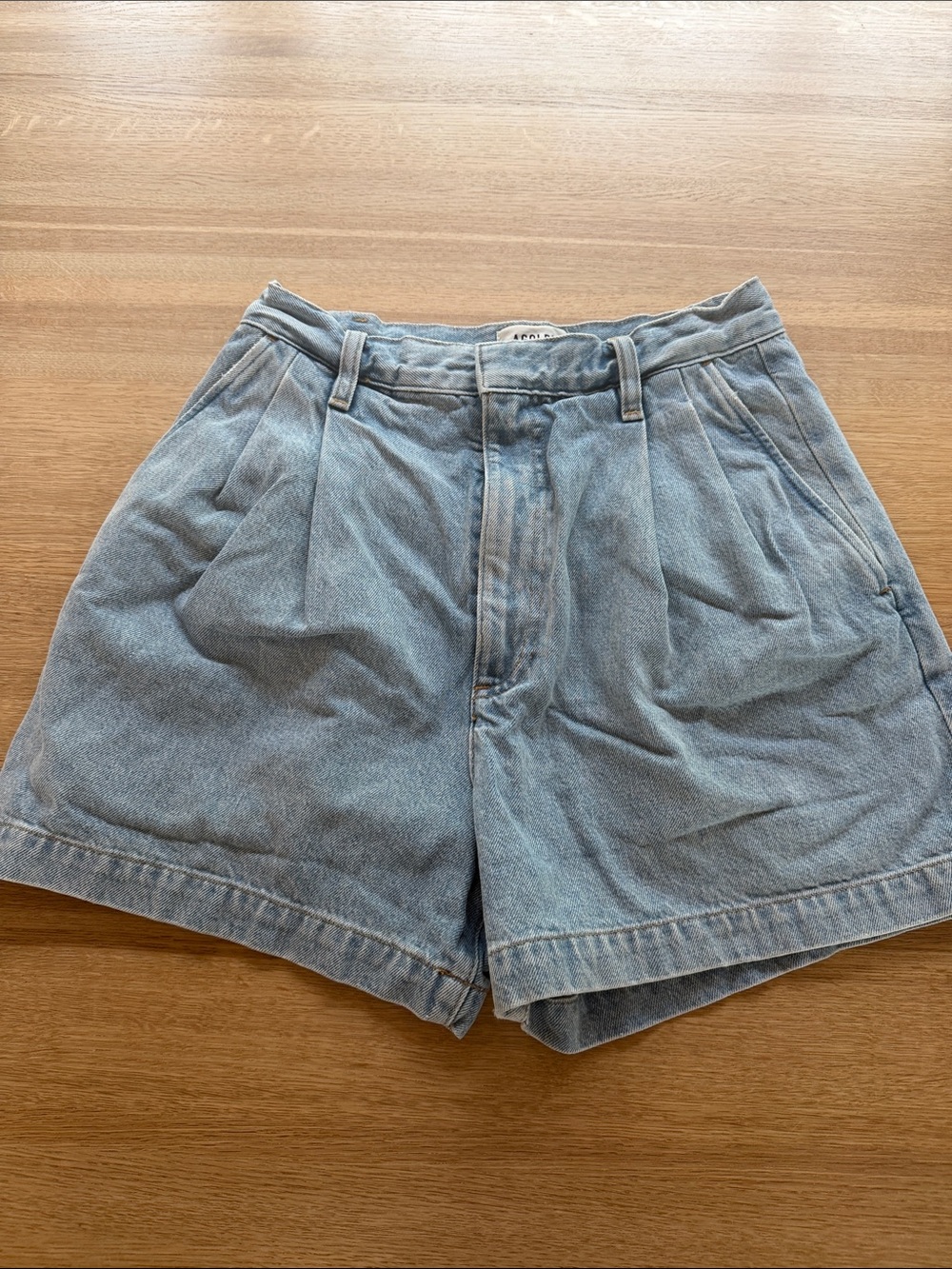 Agolde Light Wash High-Rise Pleated Denim Shorts